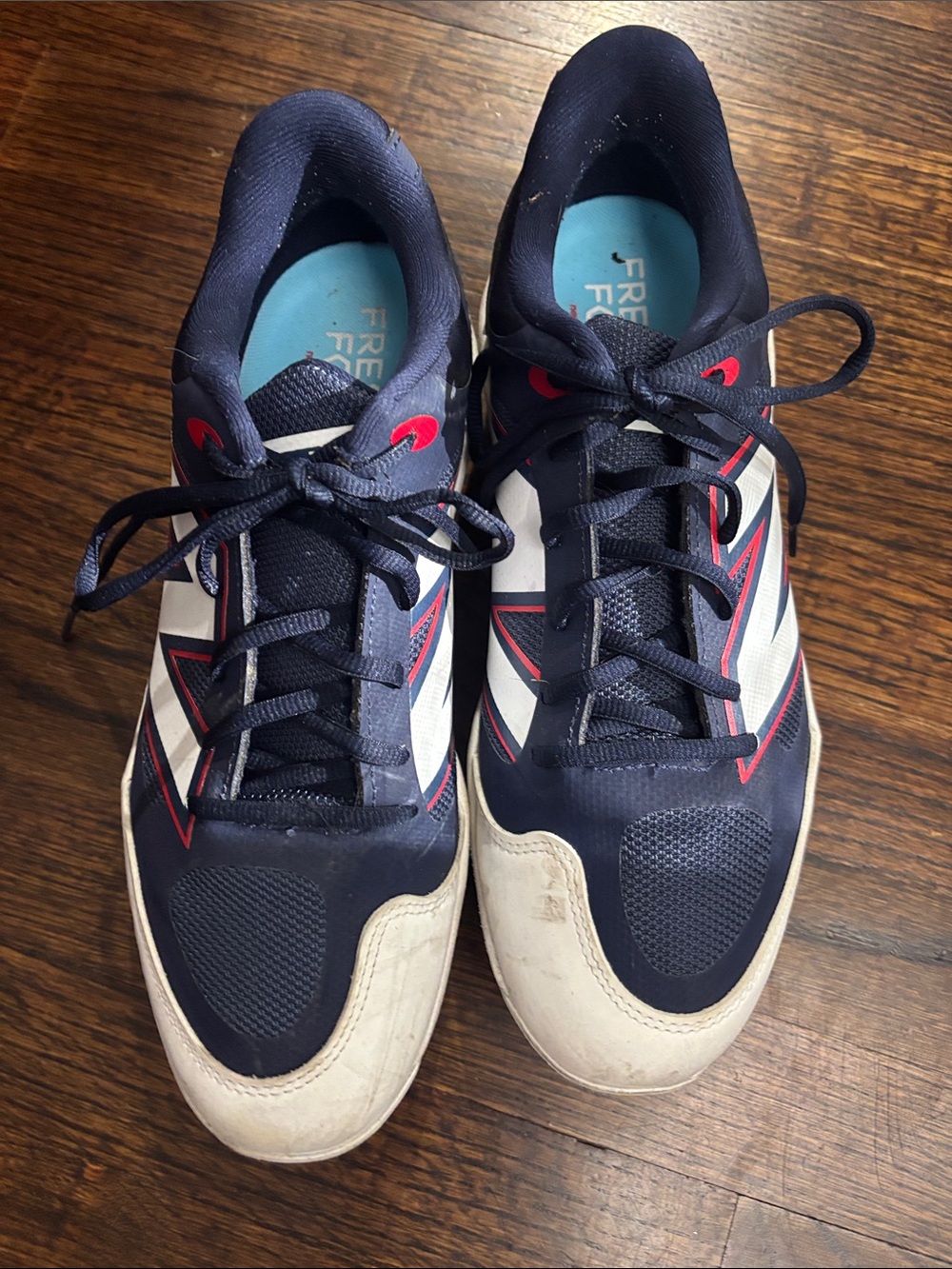 New Balance Navy, White and Red Men's Athletic Cleats